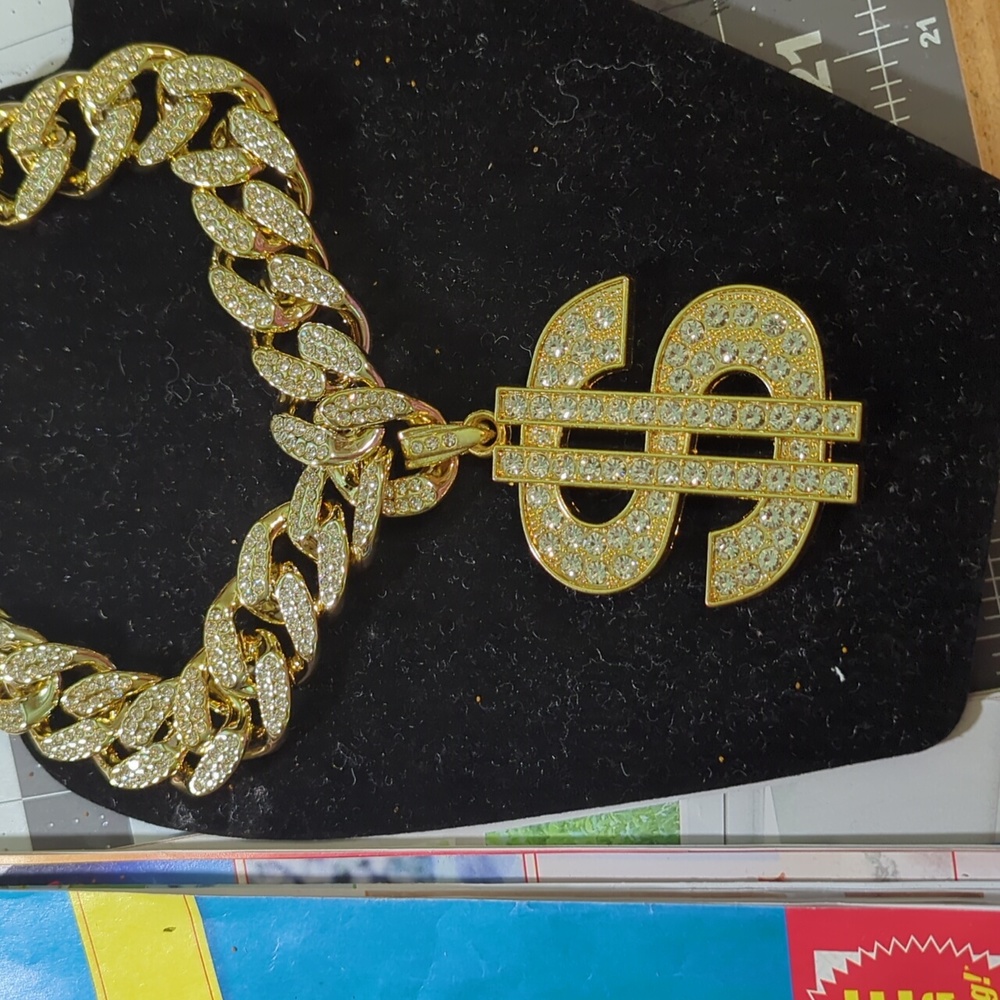 Iced out money sign
